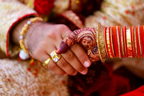 Hindu Couple Holding Hands