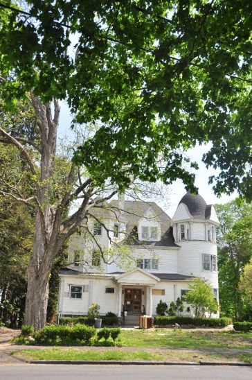Beautiful 1890 home in Danbury, CT. painted white with massive old tree in front.