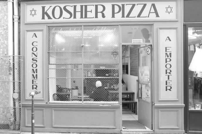 Black and white tone photo of a pizza shop called